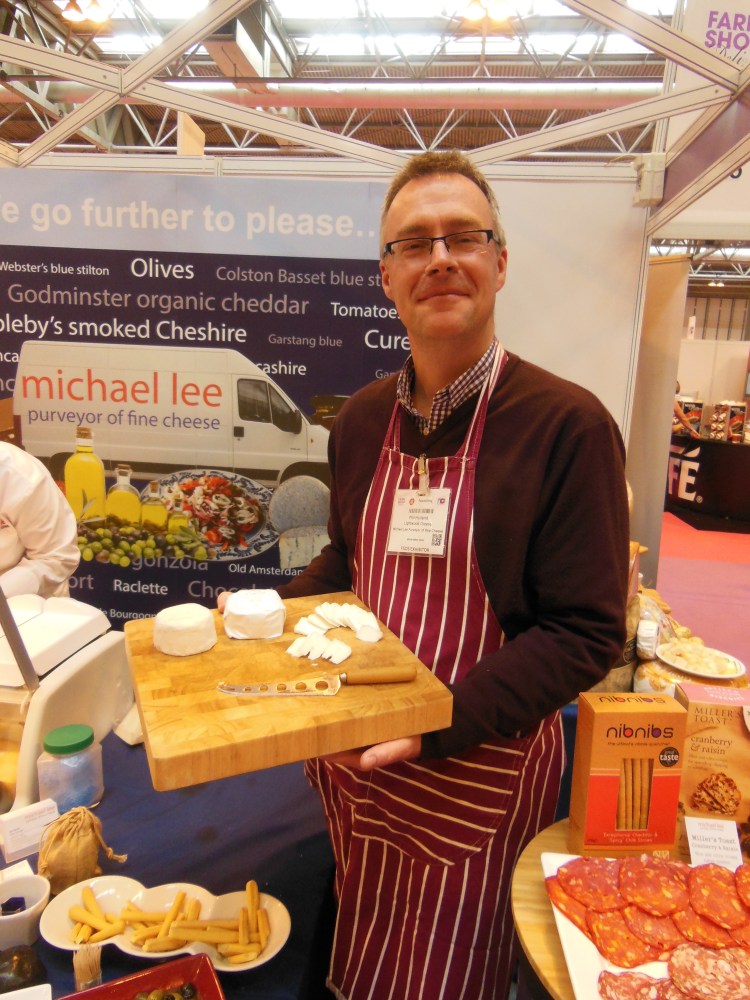 Phil Hulland displaying his wonderful Capria goats cheese.